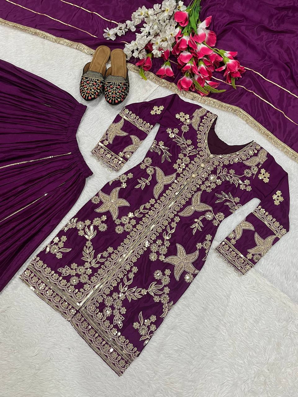 Regal Wine Purple Kurti and Flared Palazzo Suit Set Embellished with Intricate Floral Zari and Mirror Work